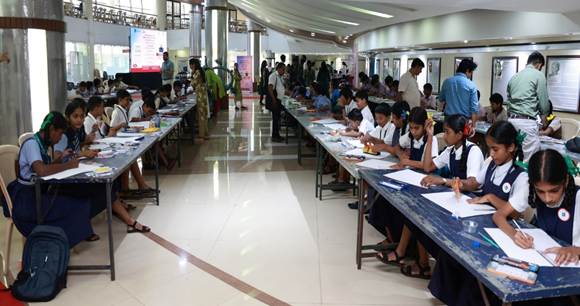 May be an image of 8 people, people studying, table and hospital