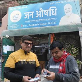 A couple of men standing outside a storeDescription automatically generated