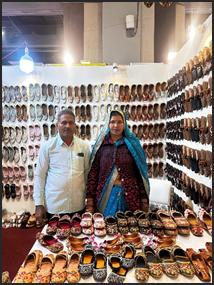 A person and person standing in front of a display of shoesAI-generated content may be incorrect.