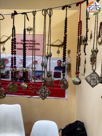 A person standing in front of a displayAI-generated content may be incorrect.