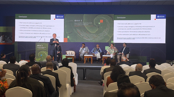 A group of people sitting in chairs in front of a large screenAI-generated content may be incorrect.