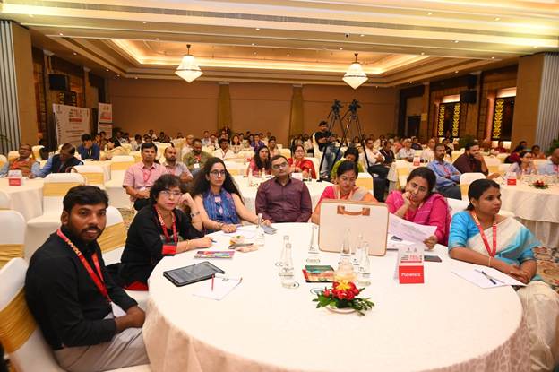 A group of people sitting at a round tableAI-generated content may be incorrect.