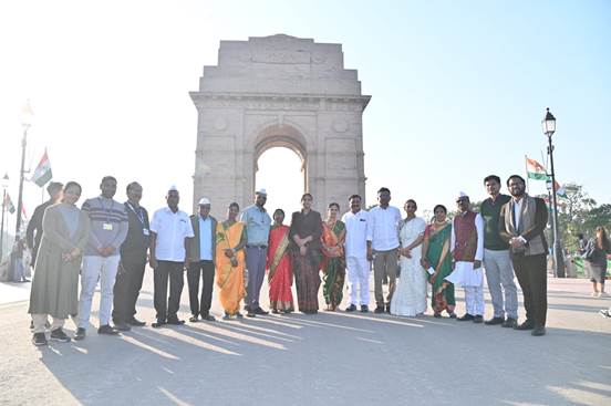 A group of people standing in front of a monumentAI-generated content may be incorrect.