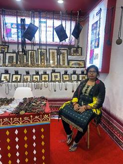 A person sitting in a room with jewelryAI-generated content may be incorrect.