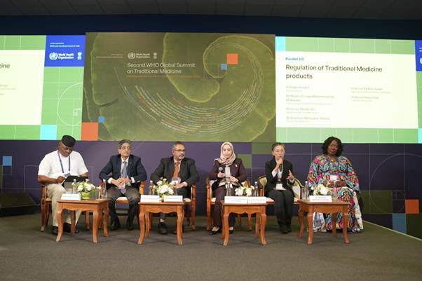 A group of people sitting on a stageAI-generated content may be incorrect.