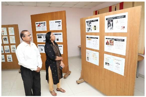 A person and person looking at a displayAI-generated content may be incorrect.